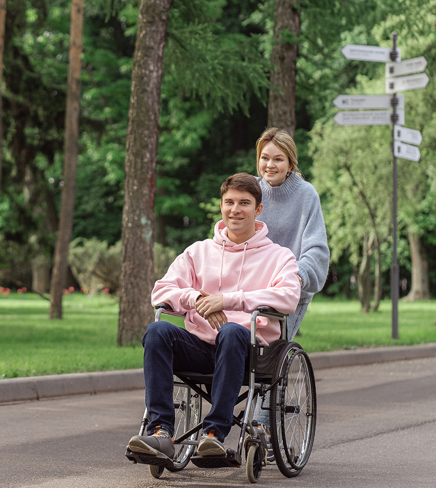 woman and man in wheel chair